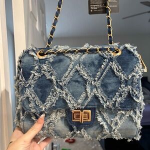 MKP collection off of Amazon never been used Stylish Denim Chain Shoulder Bag